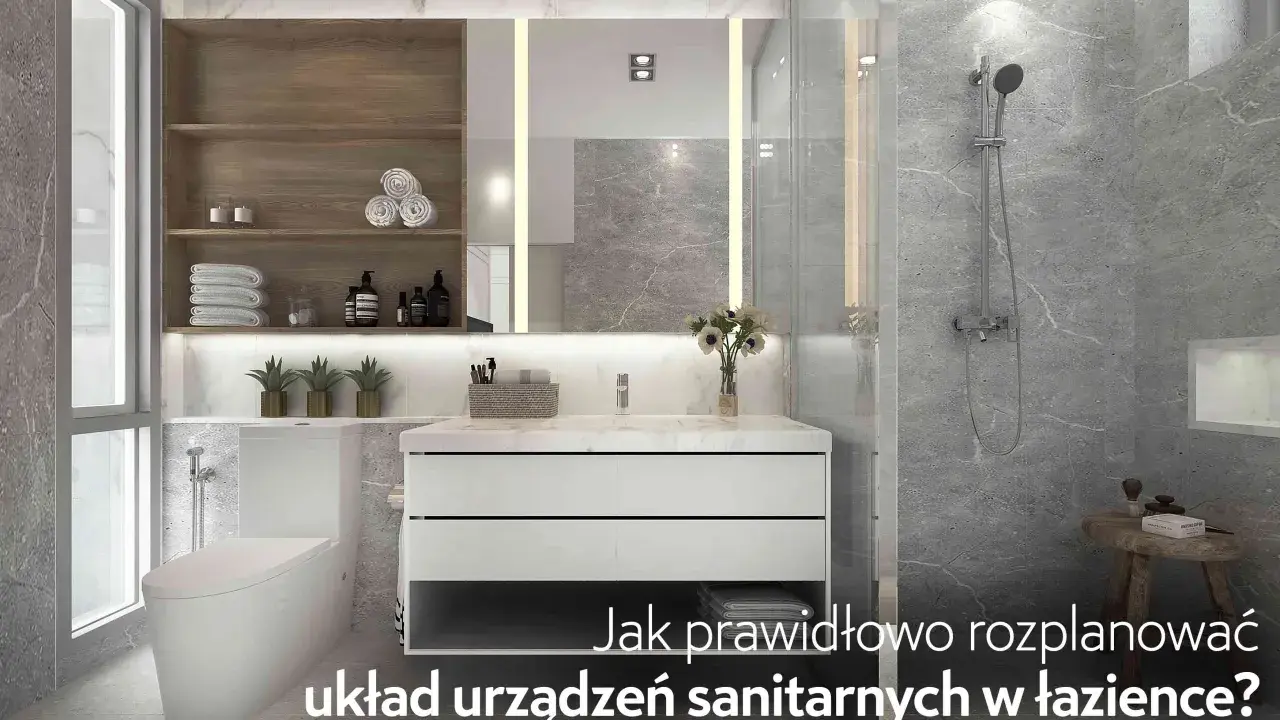 Nowoczesna łazienka z wanną, umywalką i toaletą. Prawidłowe rozmieszczenie urządzeń sanitarnych norma to klucz do funkcjonalności.