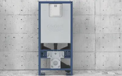 Stelaż podtynkowy Grohe z widocznym mechanizmem spłuczki. Pokazuje, jak ważna jest precyzyjna odległość geberitu od ściany dla estetyki i funkcjonalności łazienki.