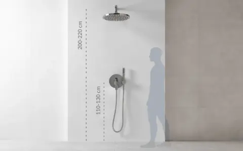 Prawidłowy montaż słuchawki prysznicowej: deszczownica na 200-220 cm, panel sterowania na 110-130 cm.